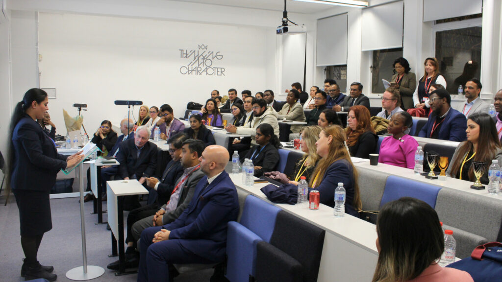 Tripti Kohli, Master of Ceremonies, addresses attendees at the Postgraduate Research Conference organised by RCL's School of Business. 