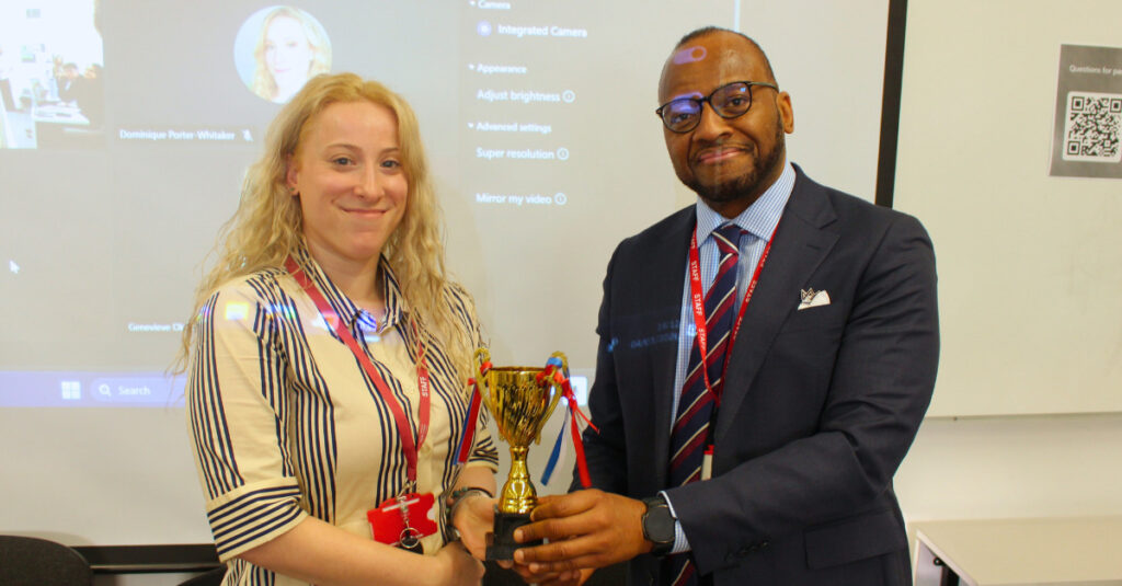 RCL School of Health and Sports Science Lecturer Dominique Porter-Whitaker accepting her award. 