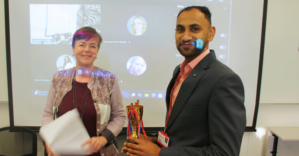 RCL School of Health and Sports Science Lecturer Dr Lithin Zacharias accepts his award.
