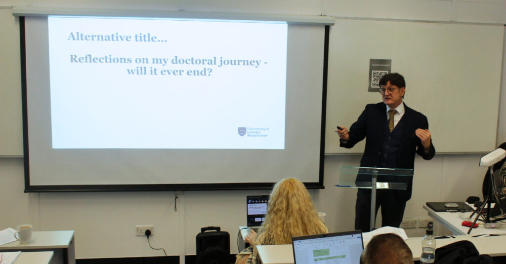 Dr Mark Holland, Associate TIRIAE Professor at the University of Greater Manchester, delivers his keynote presentation at the School of Health and Sports Science Research Showcase 2026.