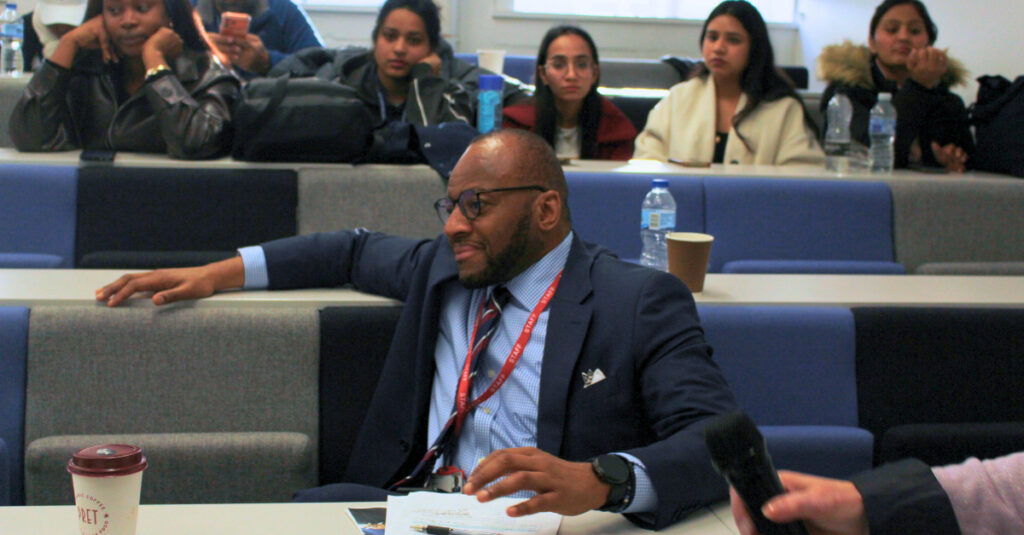 Dr Morris Anglin attending the inaugural SoHSS Postgraduate Research Showcase in March 2026.