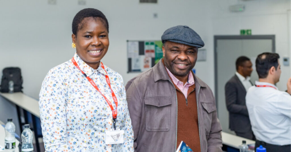 Two Regent College London academics smile warmly as they attend the Learning and Teaching Conference 2026.
