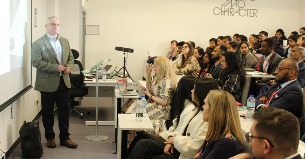 Dr James Alder, Head of Programming (Sport), delivering a keynote presentation at RCL’s School of Health and Sports Science Postgraduate Research Conference in March 2026.